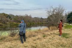 Visitors watching swamp wildlife near Houston.