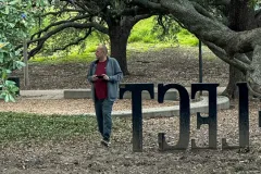 Reflect sculpture sign in park in Houston Texas