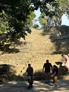 Jaro on the steps of the discovered fragments of the ruins of the Mayan city,