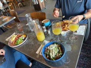 Fresh breakfast with salads and drinks at Leeland House restaurant in Galveston